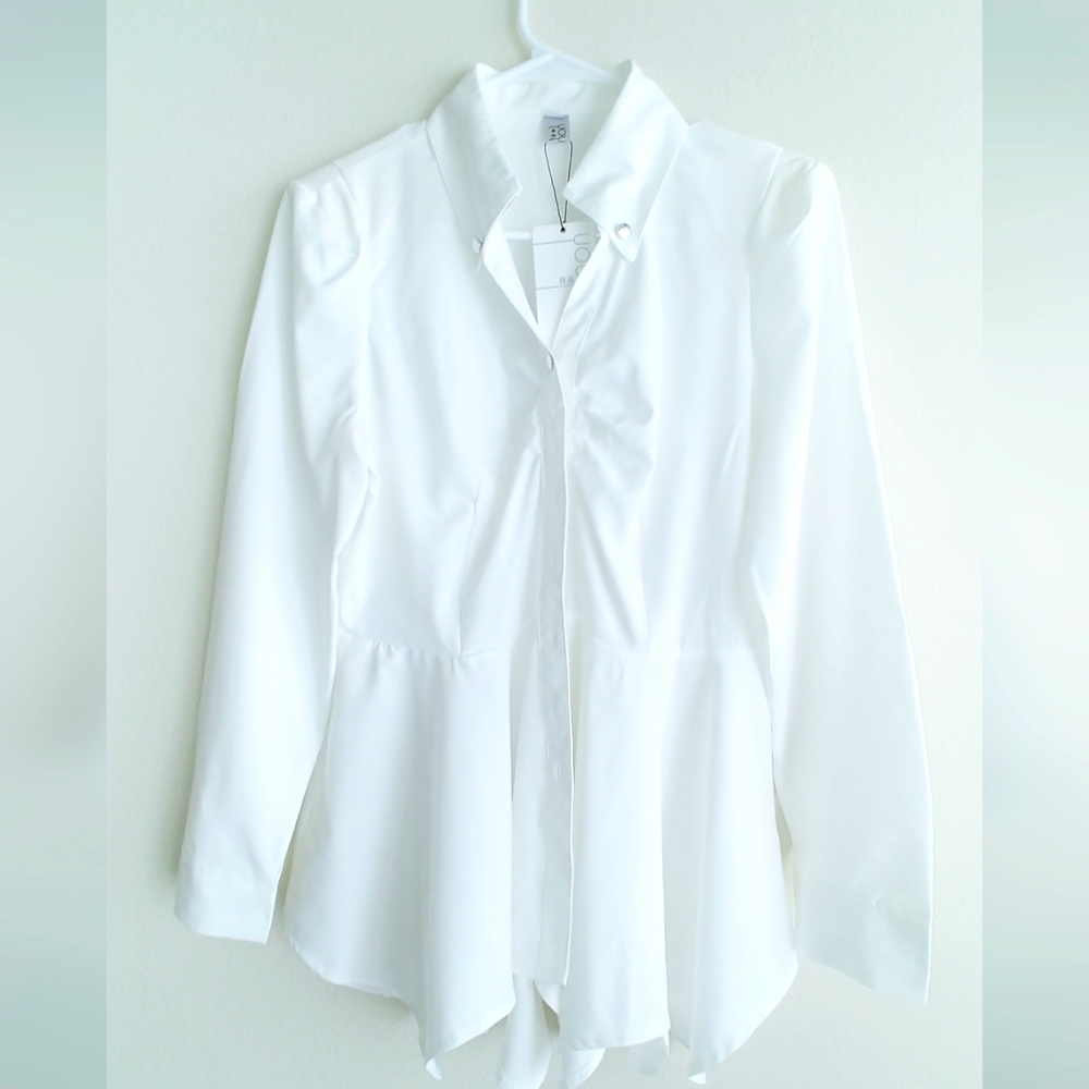 White long sleeves blouse, bust is 31' and length is 28'inches long. Rayon.